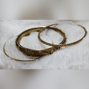 Gold tone bangles
